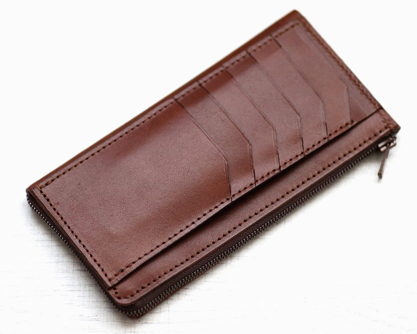「極小Lファスナー長財布」紙幣を折らずに50枚収納！日本製長財布「FRAGMANzip」